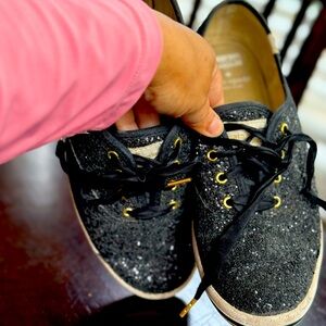 Kate Spade Black and Gold Sneakers with Sleek Design